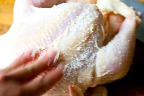 Hainanese Chicken Rice Recipe - Rub chicken with salt Hainanese Chicken Rice Recipe - Rub chicken with salt